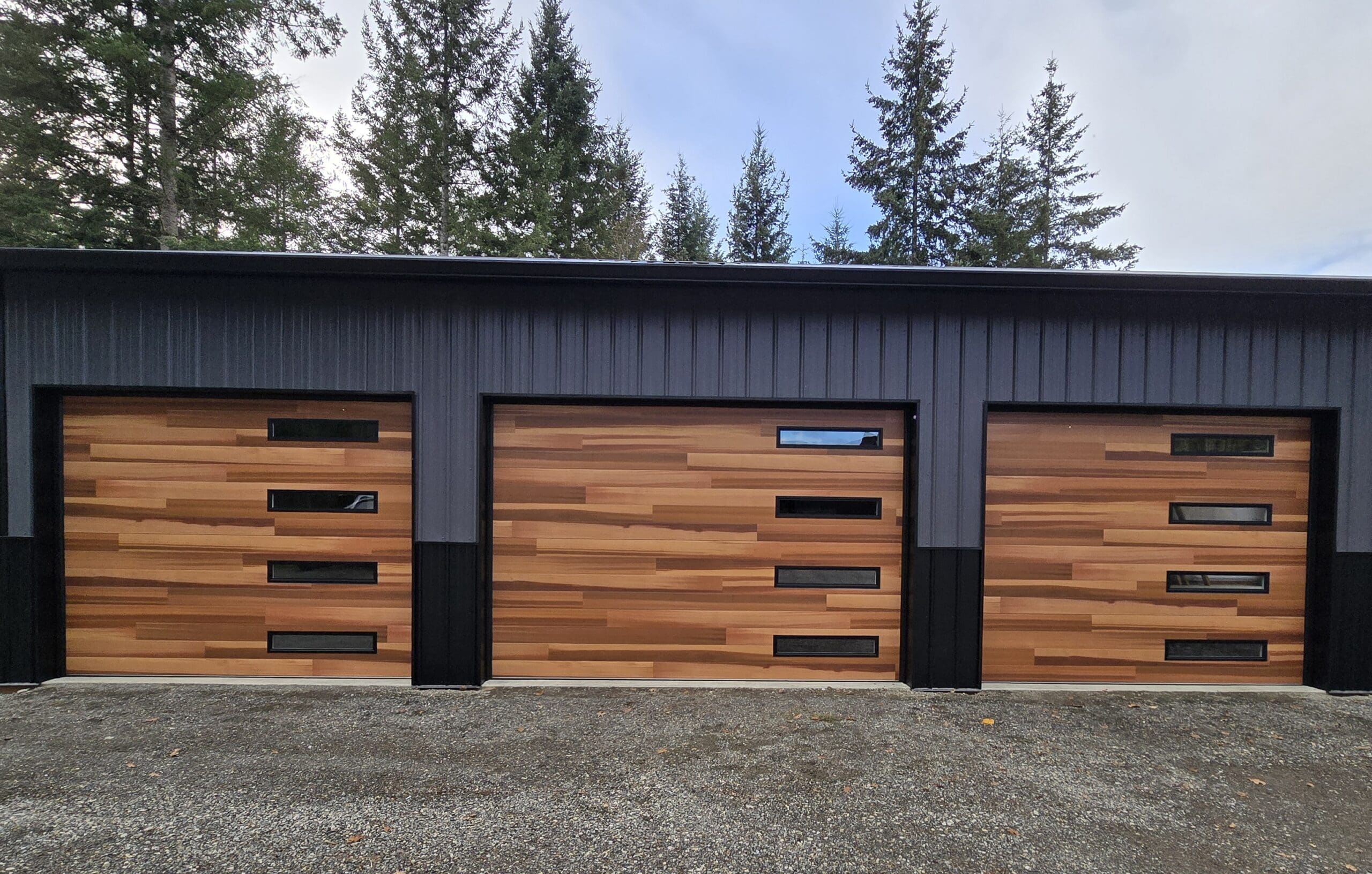 Three modern wooden garage doors