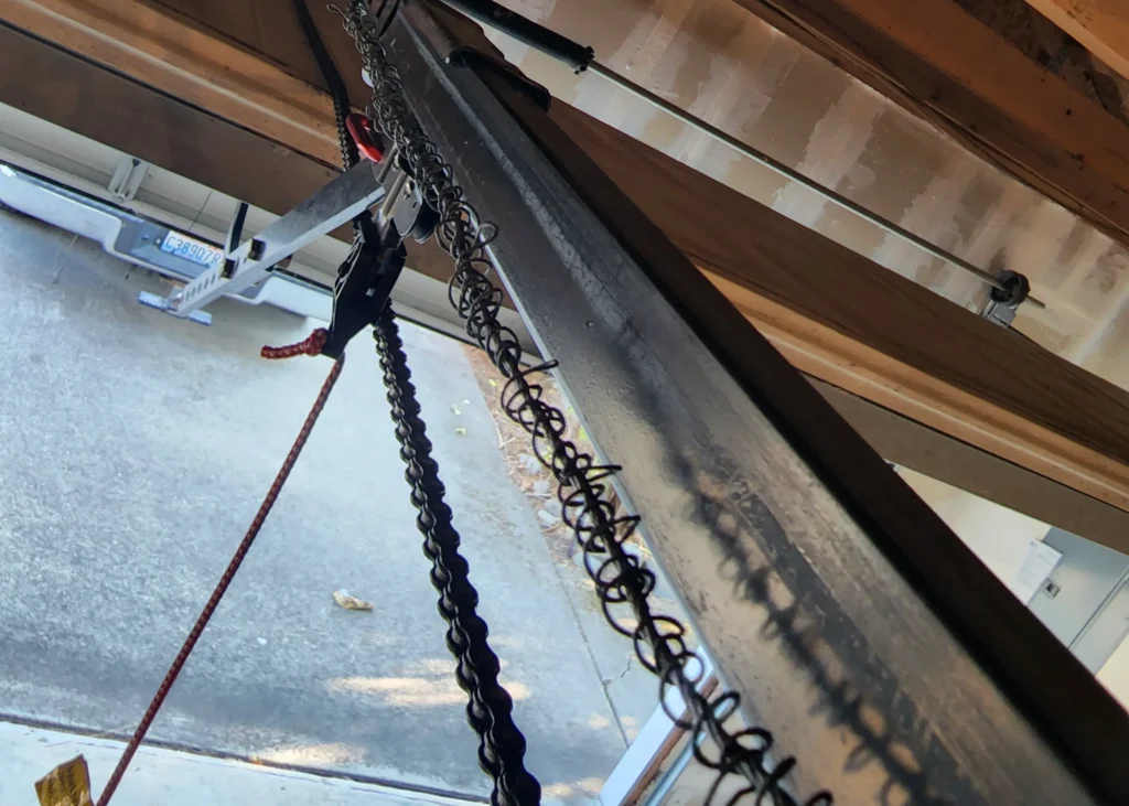 Garage door mechanism and chain
